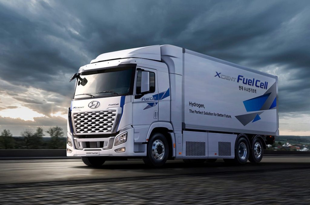 CGI image of the XCIENT Fuel Cell Truck by Hyundai driving on a road