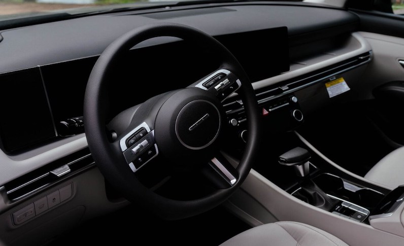 The Hyundai Tucson features an elegant, minimalistic interior design and multiple dynamic engine options for a smooth ride.