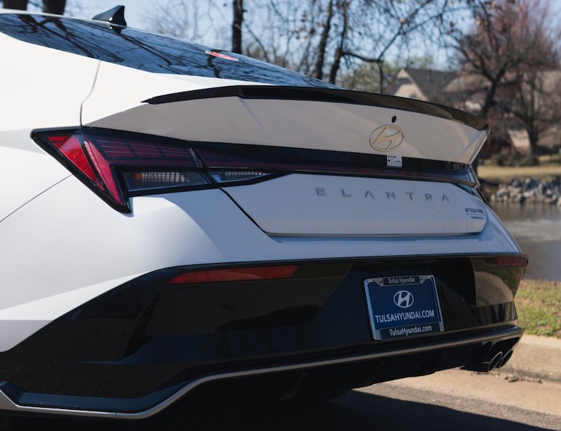 Pros of the 2025 Hyundai Elantra include a hybrid option and the design while the cons are the plastic materials and seats.